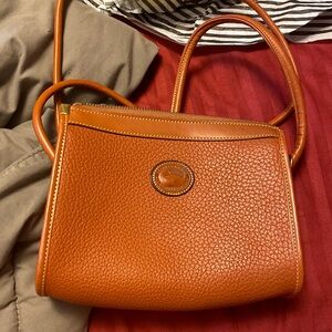 Authentic Dooney and Bourke all weather leather shoulder bag